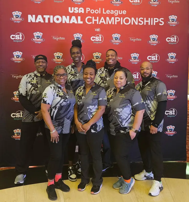 Seven players in matching black Stealth Mode jerseys at the USA Pool League Nationals
